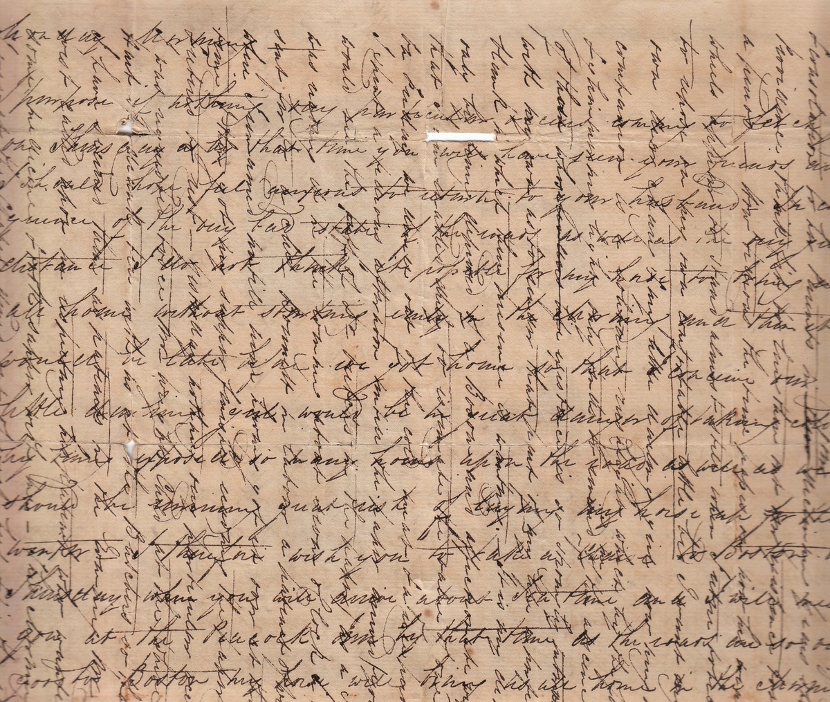 Early nineteenth-century handwritten letter with dense lines of writing crossed by a second layer of text written at right angles.